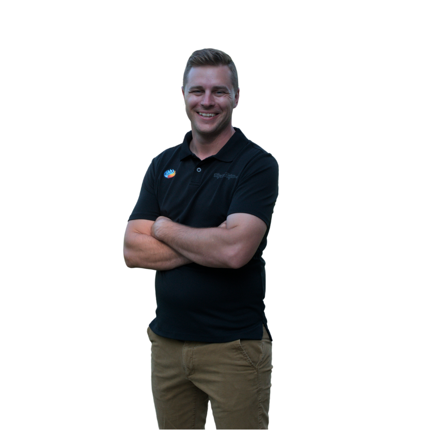 Confident Professional Man in Branded Polo Shirt Standing with Arms Crossed A smiling man stands confidently with arms crossed, wearing a black polo shirt with company logos and tan pants. His casual yet professional appearance suggests a business or service-related setting, possibly in industries like home services, technology, or customer support. The man’s relaxed posture and friendly demeanor emphasize approachability and trustworthiness.