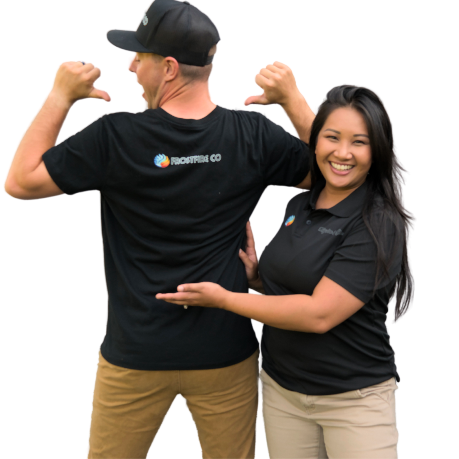 Smiling Team in Branded Frostfire Co Apparel Highlighting Company Logo Two smiling team members wearing black Frostfire Co branded shirts, with the man pointing to the logo on his back and the woman gesturing toward it, showcasing company pride and teamwork